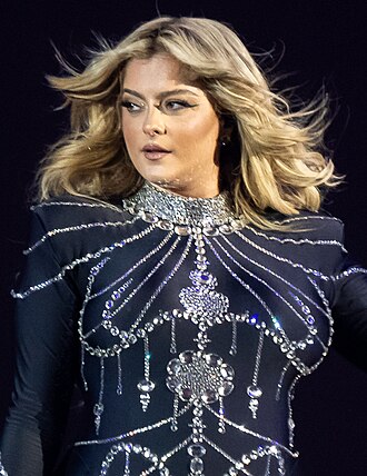 Portrait of Bebe Rexha - Sable personality